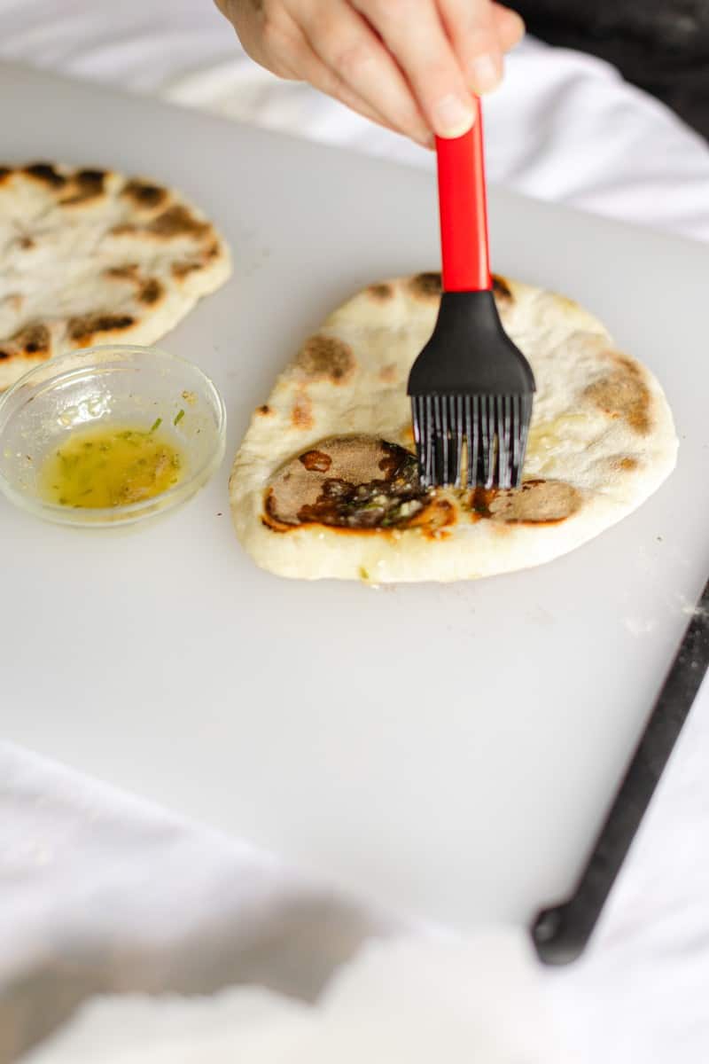 Adding a Layer of Garlic Butter to Naan Bread