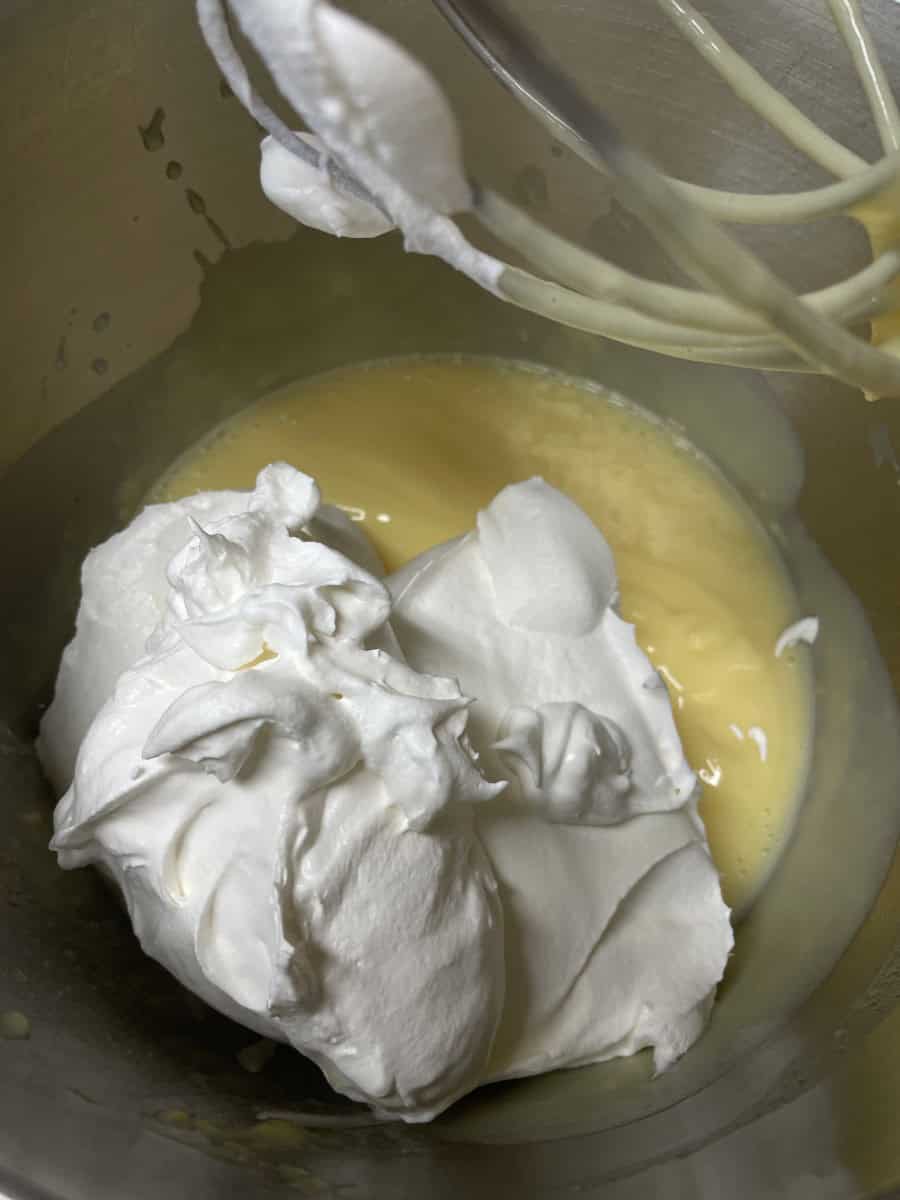 Adding the Cool Whip to the Vanilla Pudding in the Mixing Bowl