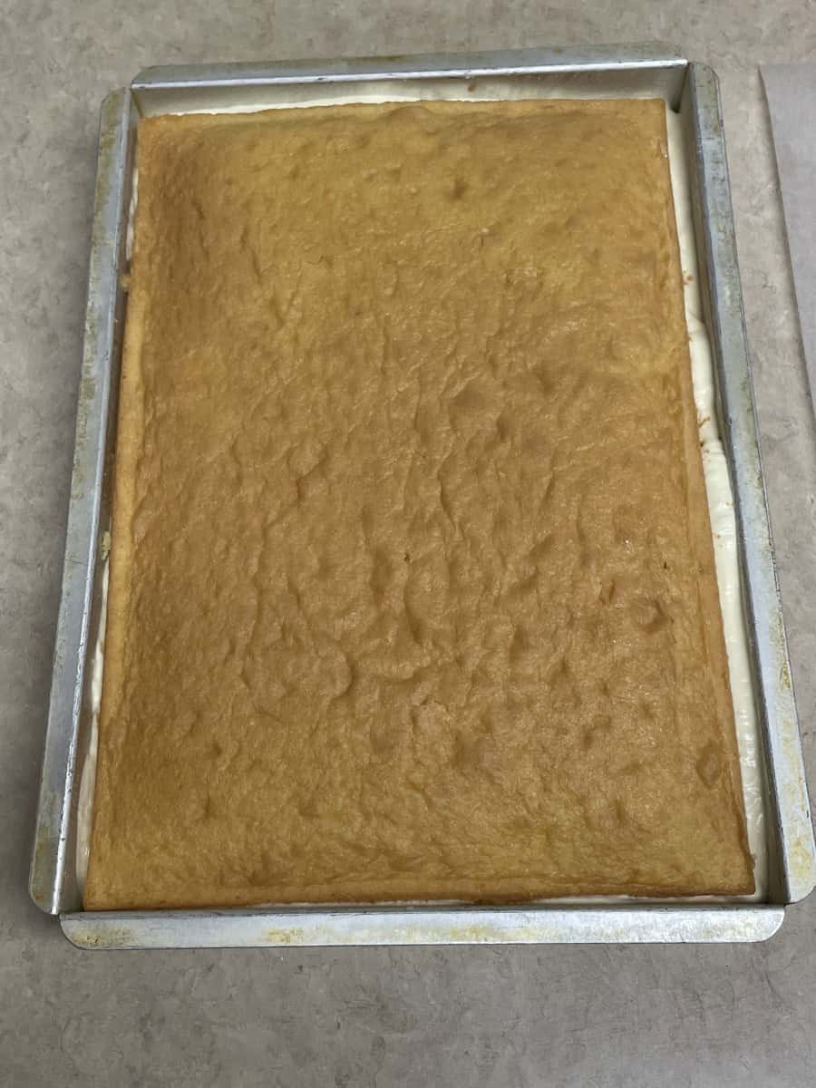 Flip the Top Cake Layer Onto the Filling Being Careful Not to Break the Cake