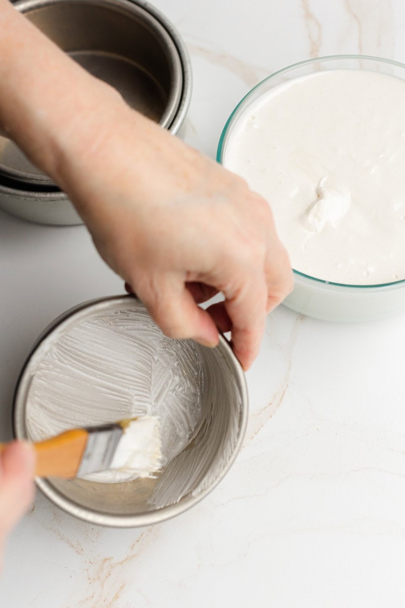 Chef Sherry Ronning Greasing a Cake Pan with Cake Release
