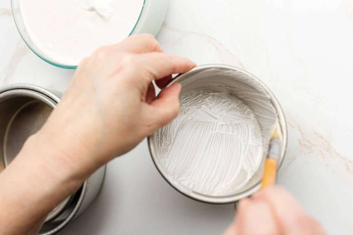 Using a Pastry Brush to Spread Pan Grease onto a pan