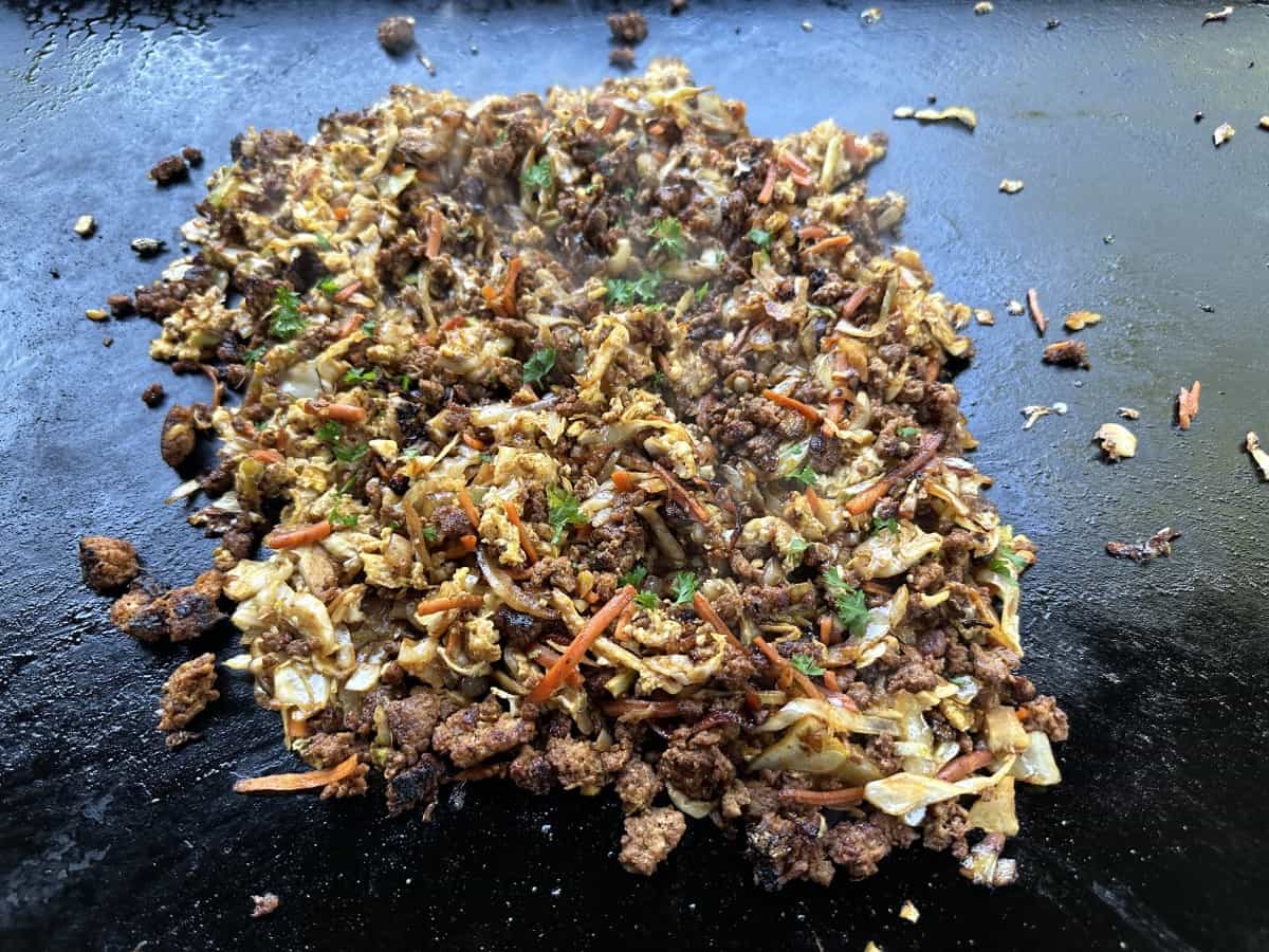 Egg Roll in a Bowl with Coleslaw Mix on the Griddle