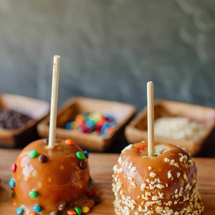 Two-Caramel-Apples-on-a-Wooden