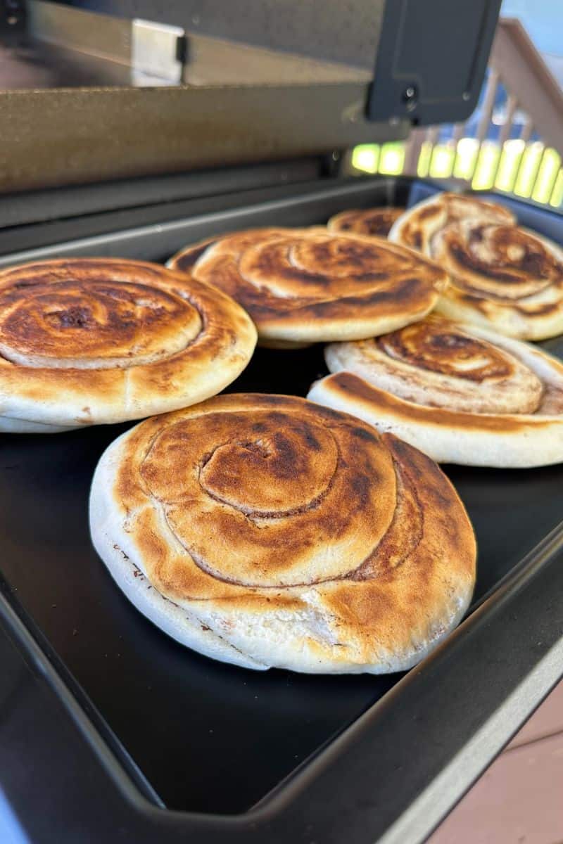 Cinnamon Roll Cake Layers Cooling on a tray