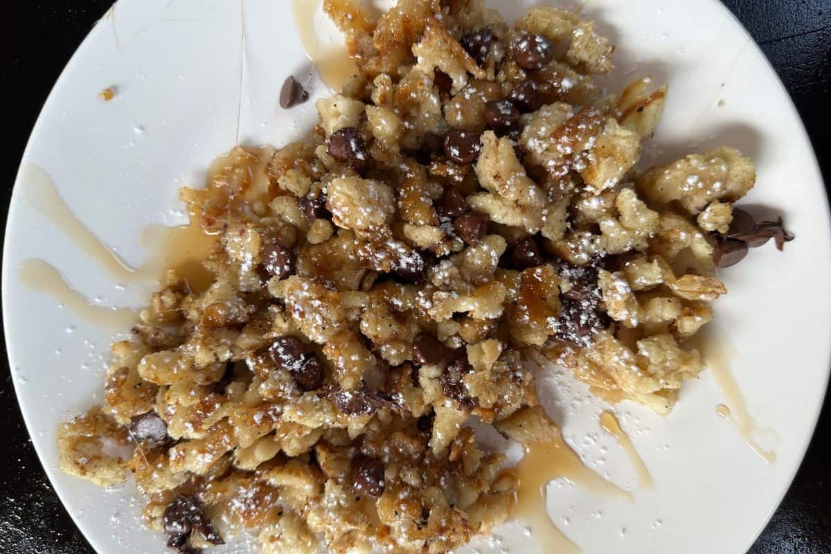 A Plate of Griddle Scrambled Pancakes Drizzled with Syrup