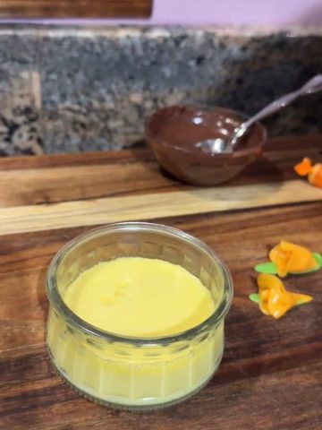 Blackstone Griddle Creme Brulee on a wooden cutting board.