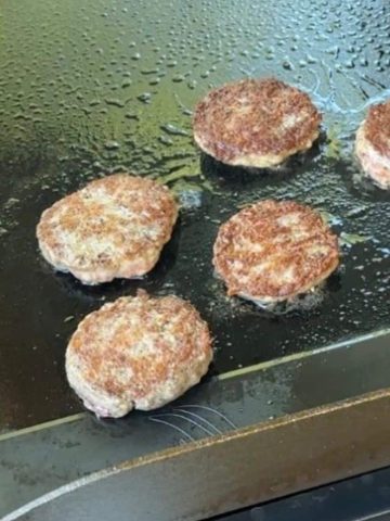 Sausage Patties cooking on a Blackstone Griddle