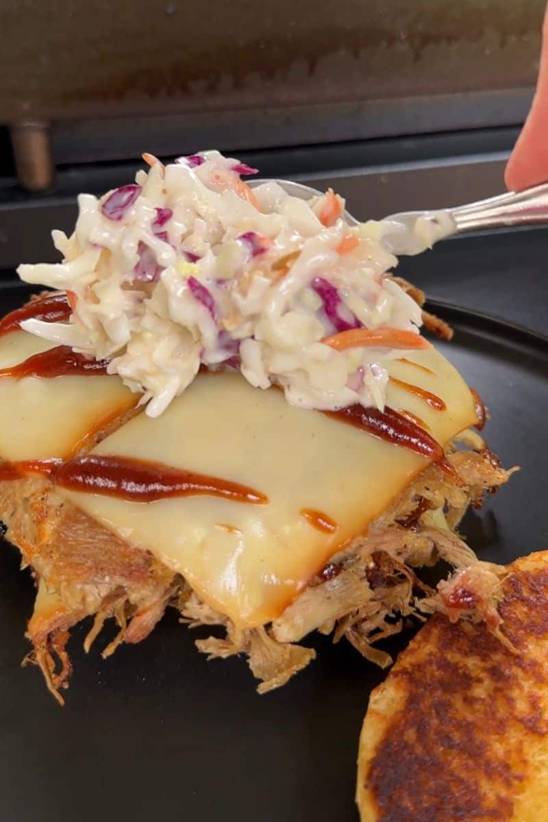 Drizzle BBQ Sauce on top of the Smashed Patties
