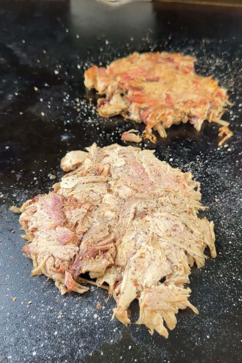 Smashed Pulled Pork Cooking on a Blackstone Griddle