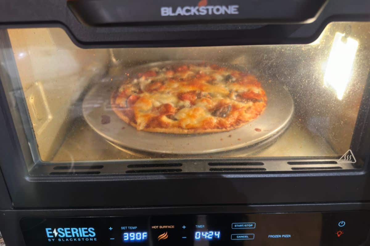 A Fully Cooked Frozen Pizza in Pizza Oven