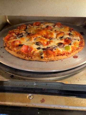 A Cooked Frozen Pizza in Pizza Oven