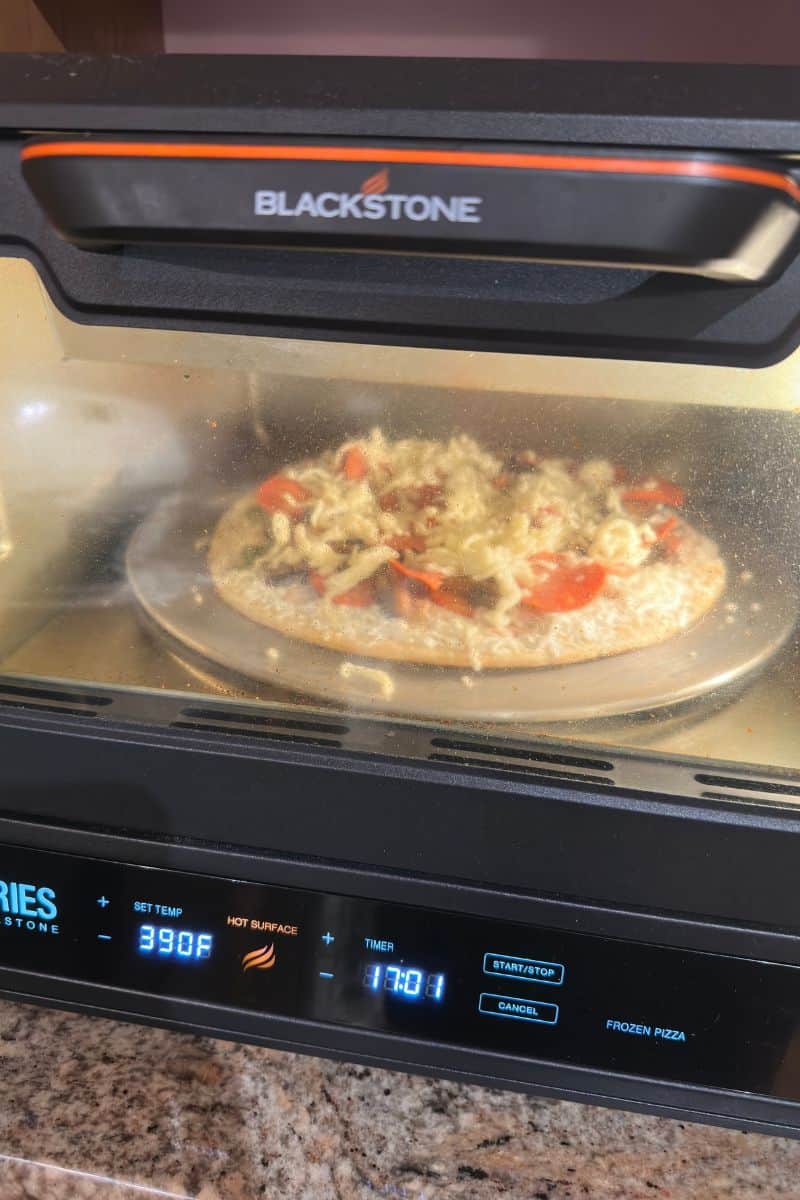 A Loaded Frozen Pizza in a Blackstone Pizza Oven