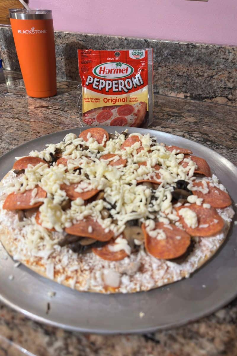 Topping a Frozen Pizza with Extra Ingredients